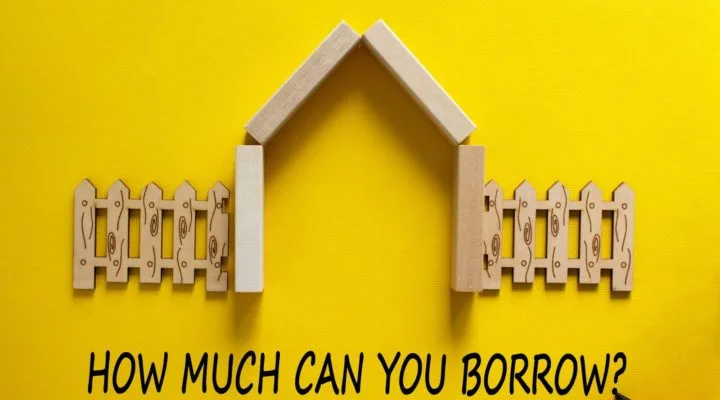 wooden house with how much can i borrow written underneath