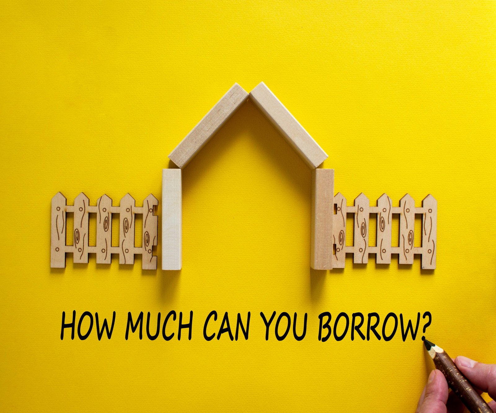 wooden house with how much can i borrow written underneath