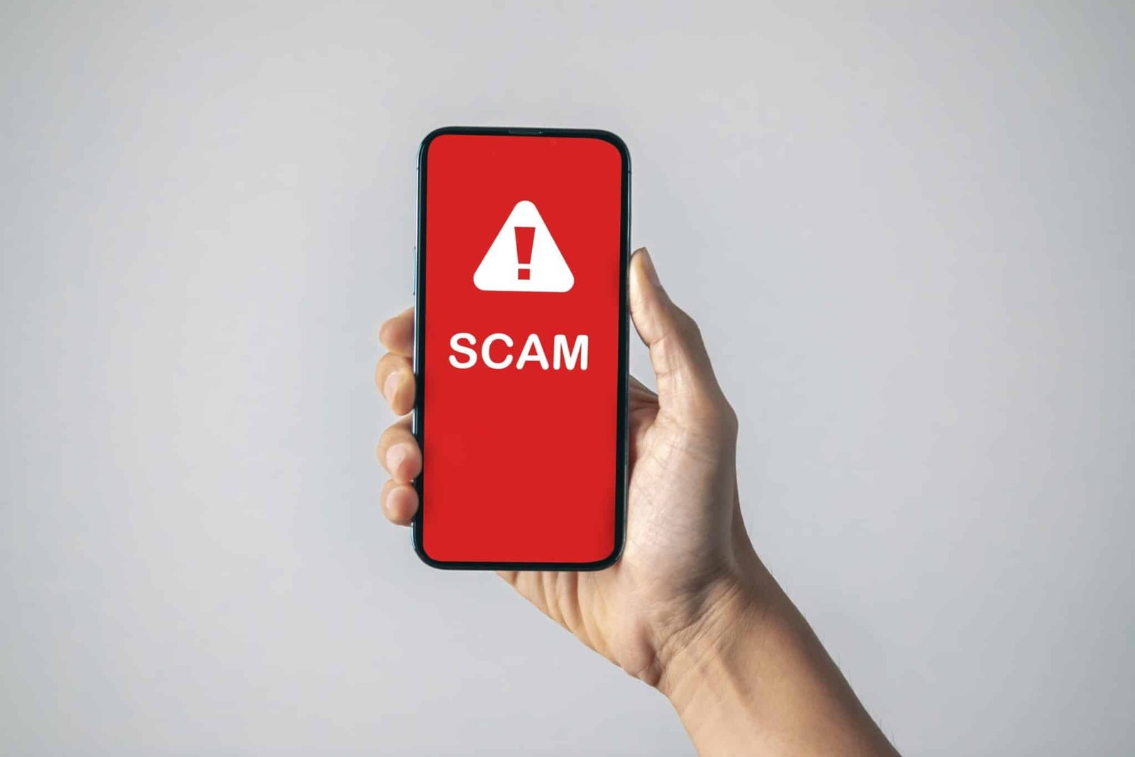 Mobile phone displaying scam text