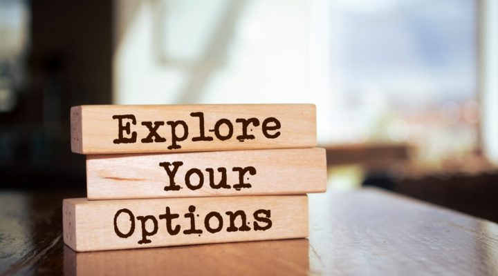 Explore you options written on wooden blocks