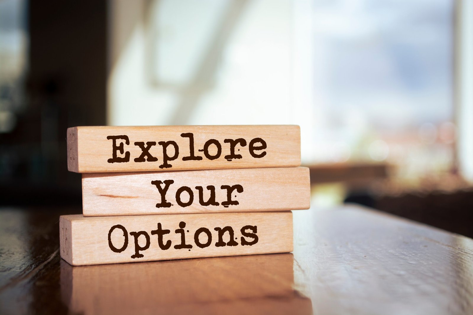Explore you options written on wooden blocks